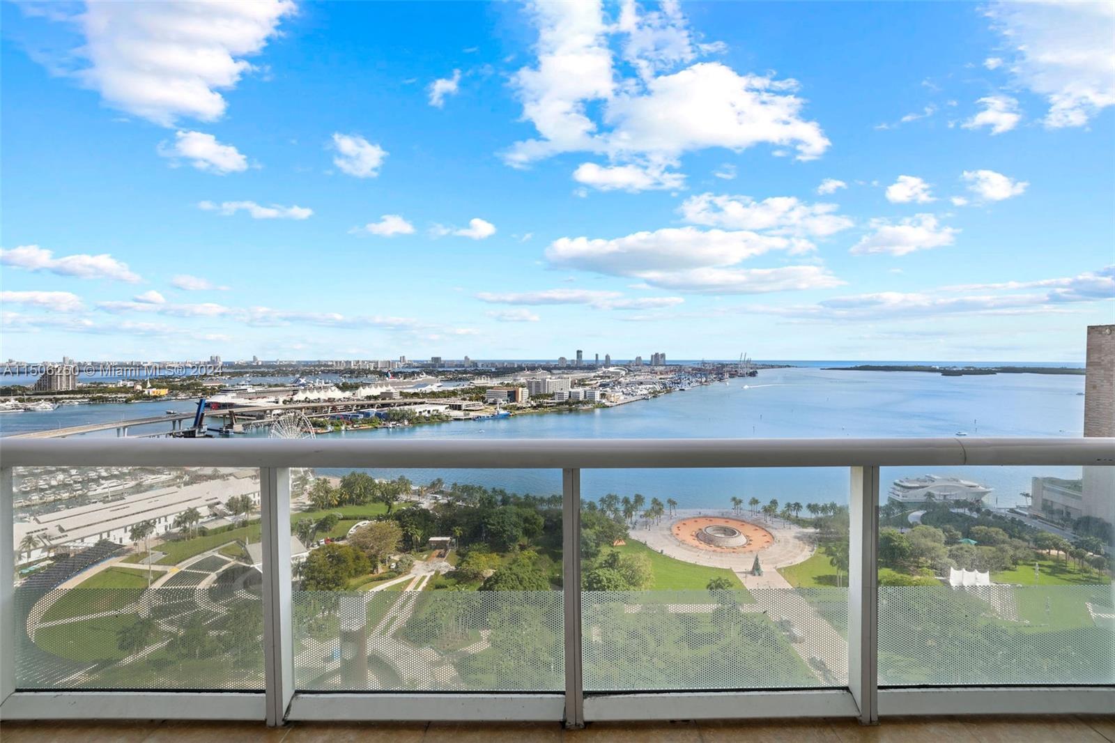 50 Biscayne Boulevard, Unit 3102 Miami, FL 33132 - Photo 31 of 43 a view of a lake from a balcony