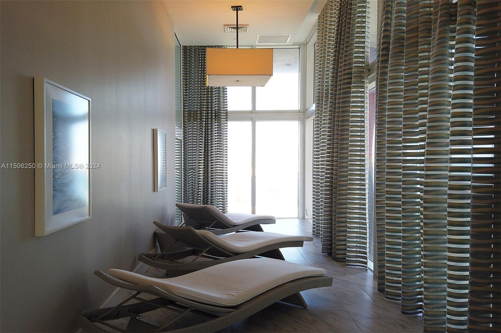 50 Biscayne Boulevard, Unit 3102 Miami, FL 33132 - Photo 36 of 43 a living room with furniture and a window