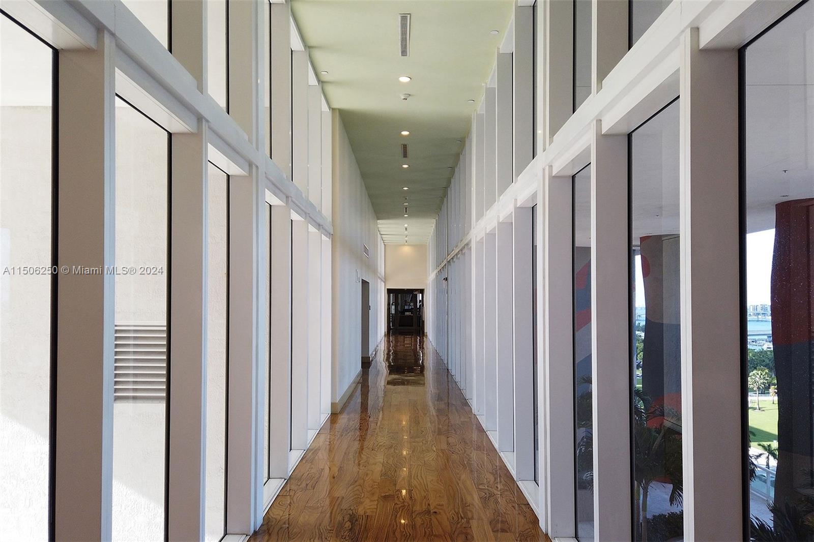 50 Biscayne Boulevard, Unit 3102 Miami, FL 33132 - Photo 42 of 43 a view of a hallway with a white walls