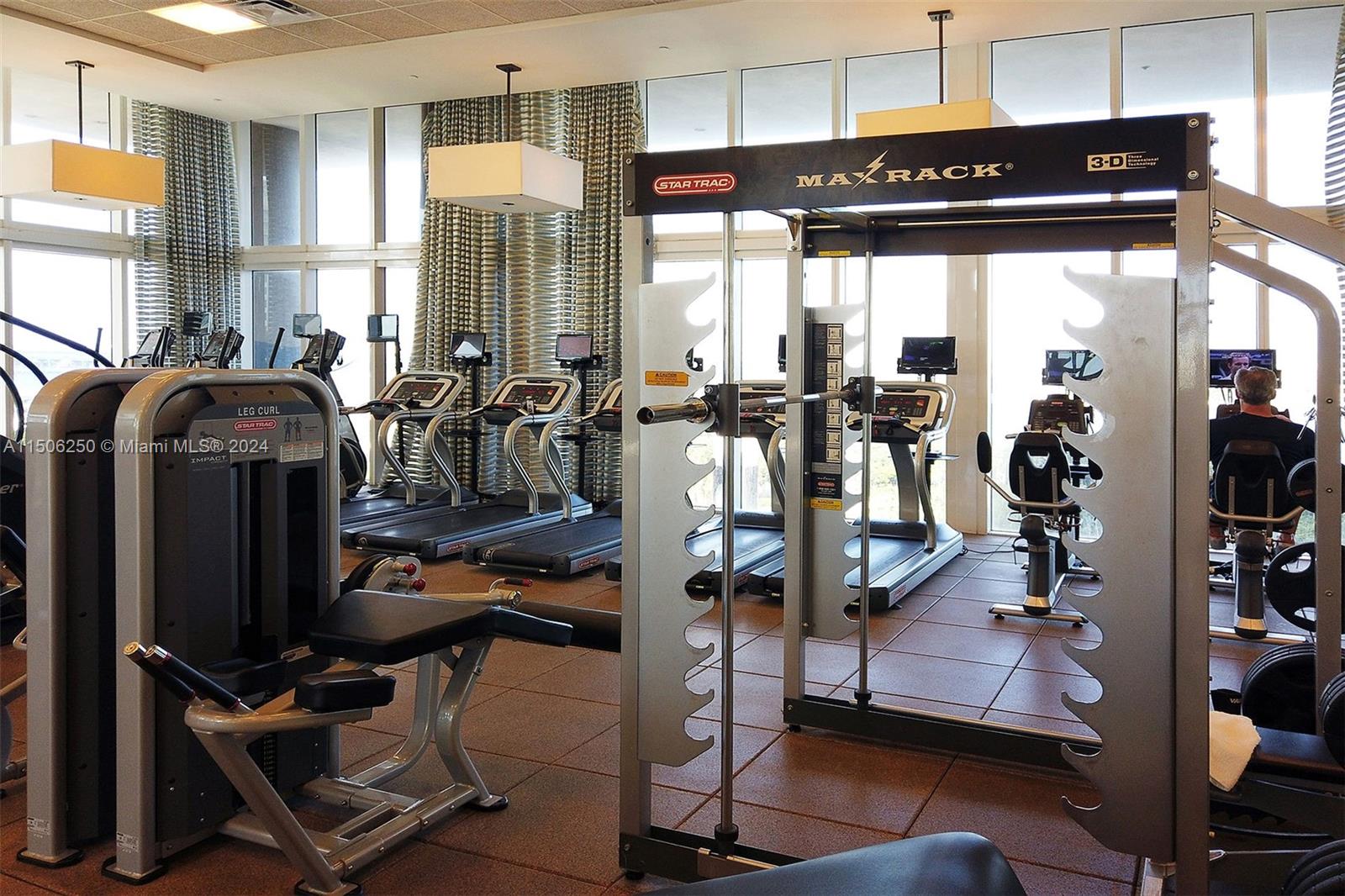 50 Biscayne Boulevard, Unit 3102 Miami, FL 33132 - Photo 43 of 43 a view of a room with gym equipment