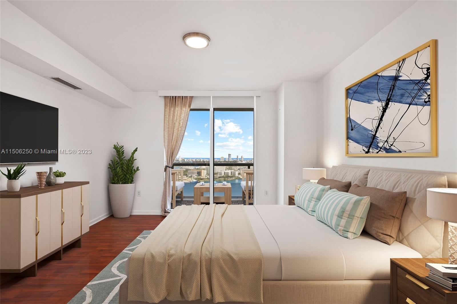 50 Biscayne Boulevard, Unit 3102 Miami, FL 33132 - Photo 5 of 43 a bedroom with a large bed and a flat screen tv