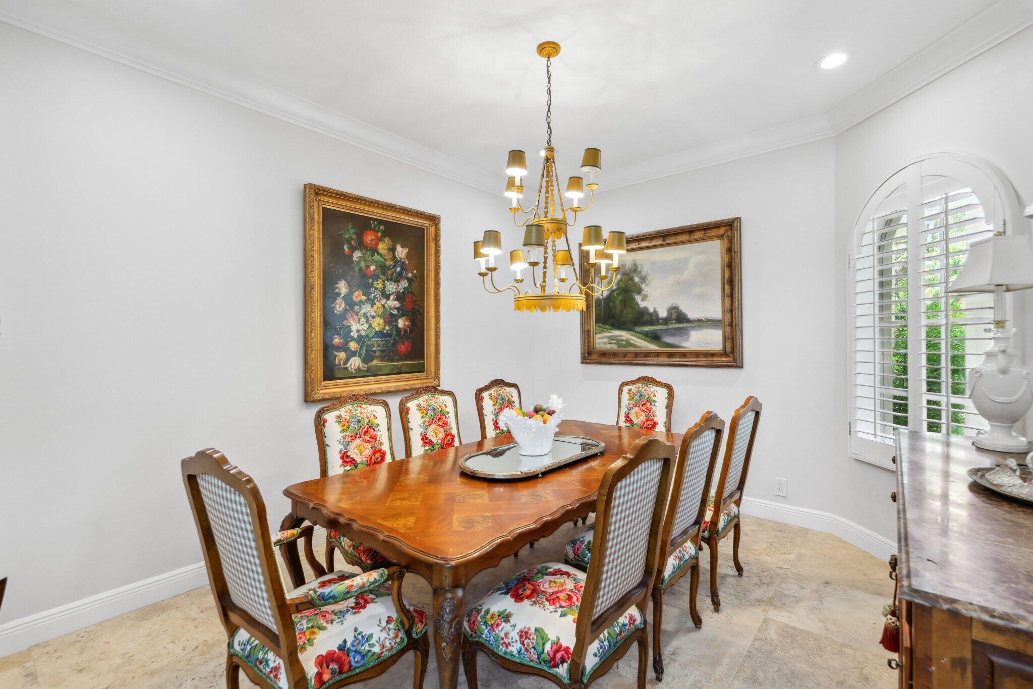 1018 Grand Court Highland Beach, FL 33487 - Photo 12 of 70 a dining room with furniture and window
