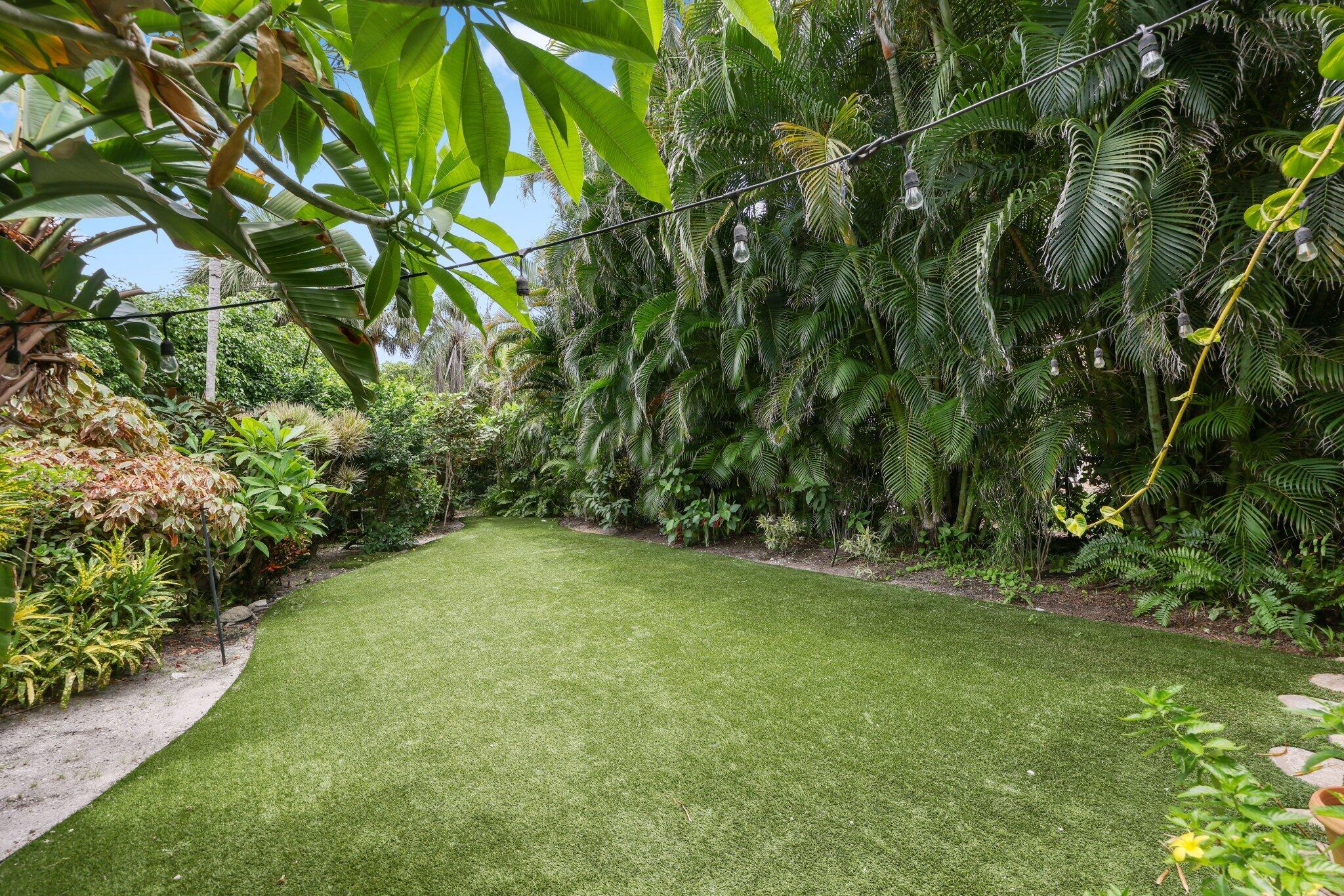 1018 Grand Court Highland Beach, FL 33487 - Photo 28 of 70 a view of a field with a tree