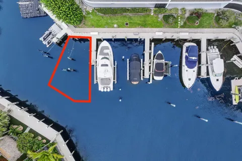 a front view of a house with a yard and a garage