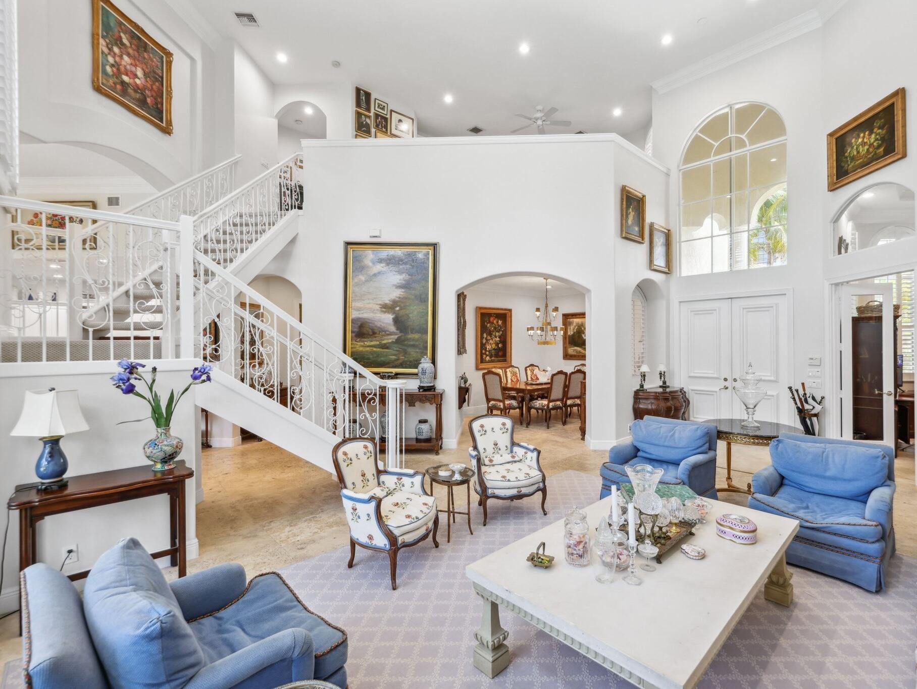 1018 Grand Court Highland Beach, FL 33487 - Photo 9 of 70 a living room with furniture kitchen view and a wooden floor