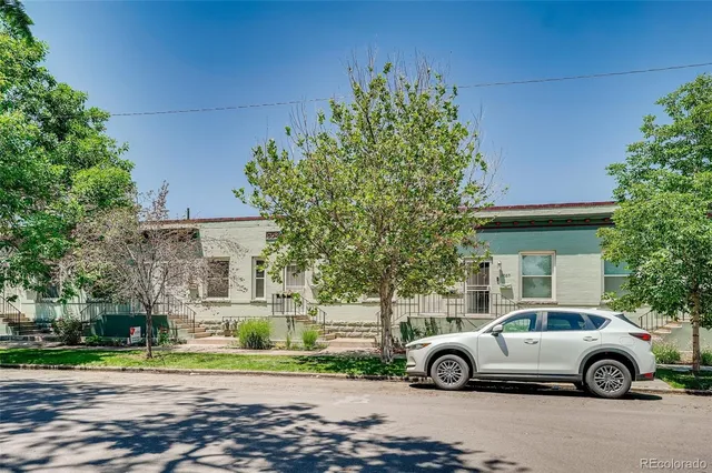 a car parked in front of a house
