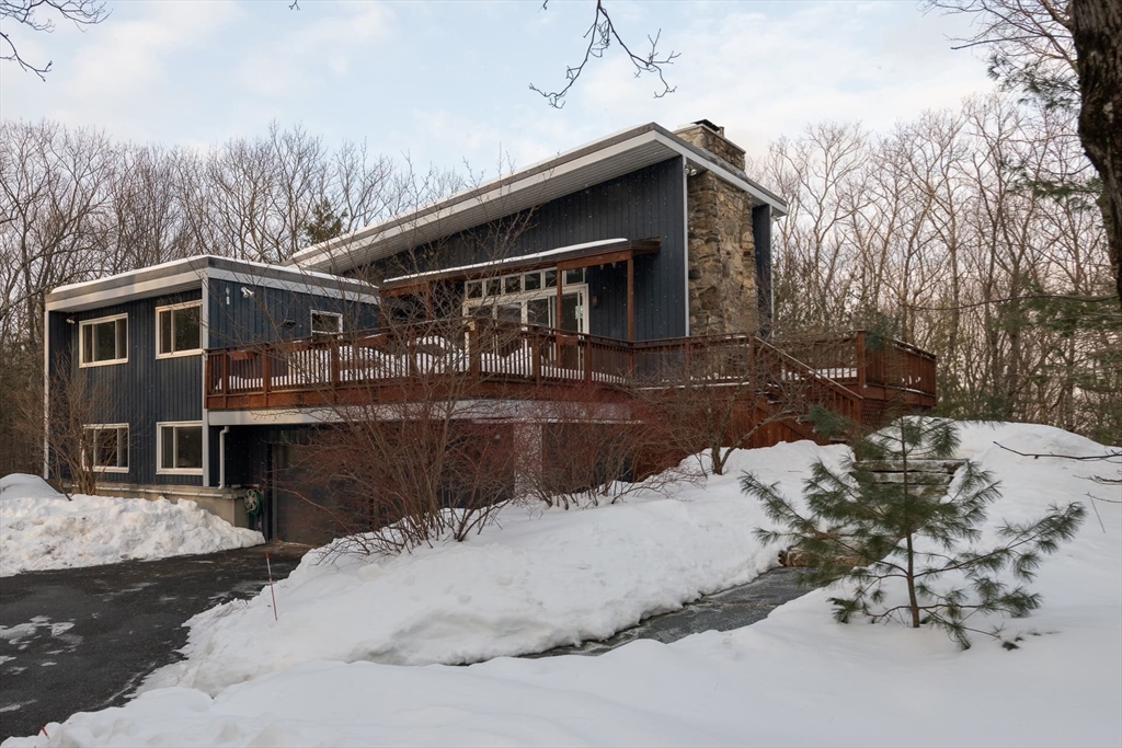 100 Bradford Road Weston, MA 02493 - Photo 36 of 42 a view of a house with a yard