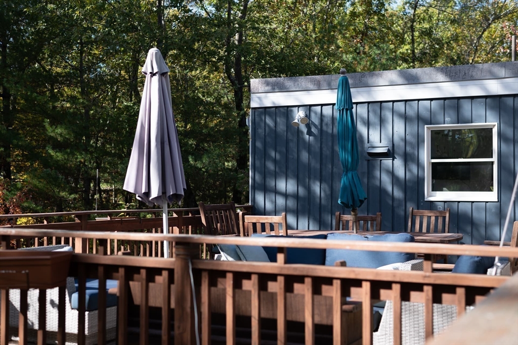 100 Bradford Road Weston, MA 02493 - Photo 40 of 42 a view of outdoor sitting area with furniture and wooden deck