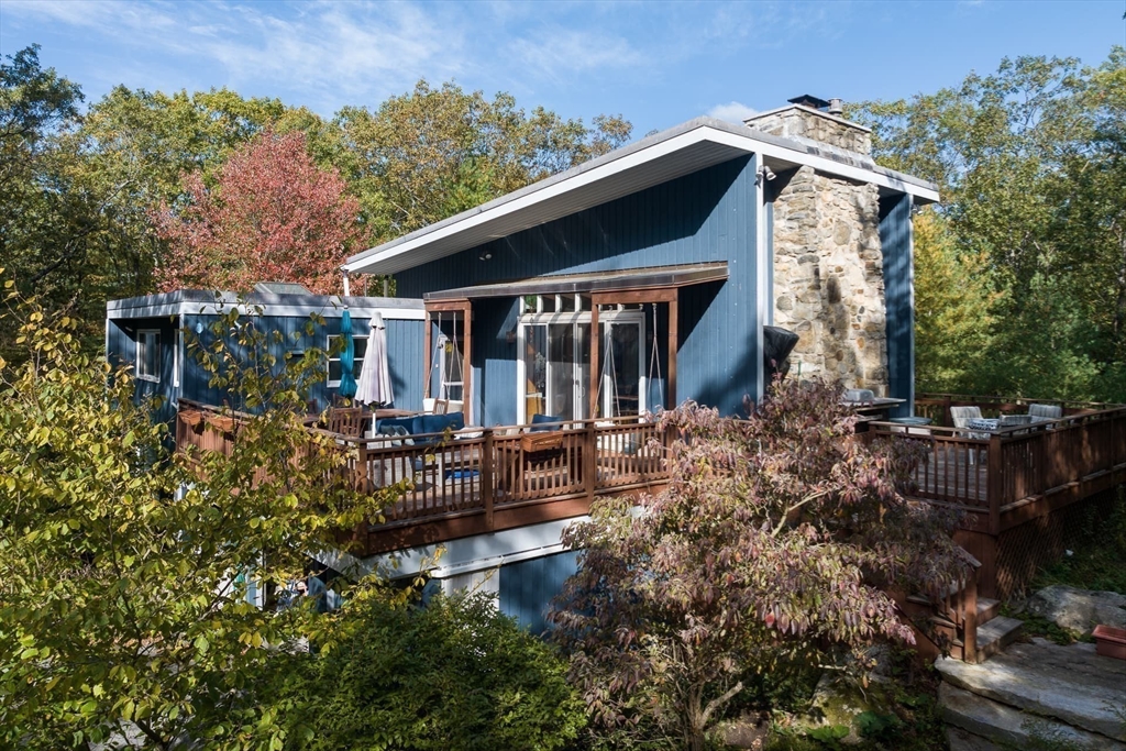 100 Bradford Road Weston, MA 02493 - Photo 5 of 42 front view of house with a yard