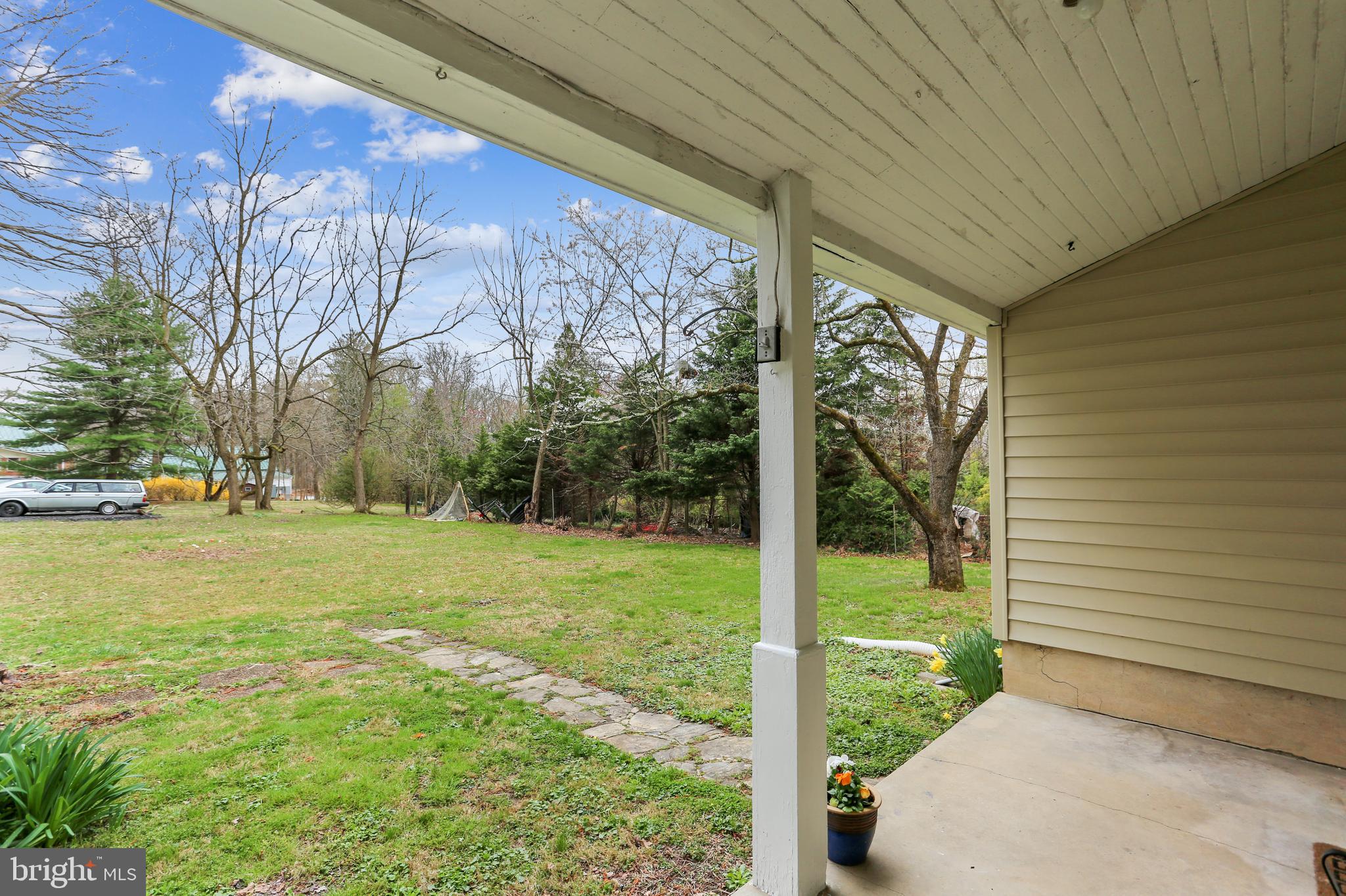 616 Olney Sandy Spring Road Sandy Spring, MD 20860 - Photo 25 of 31 a view of a yard with a tree