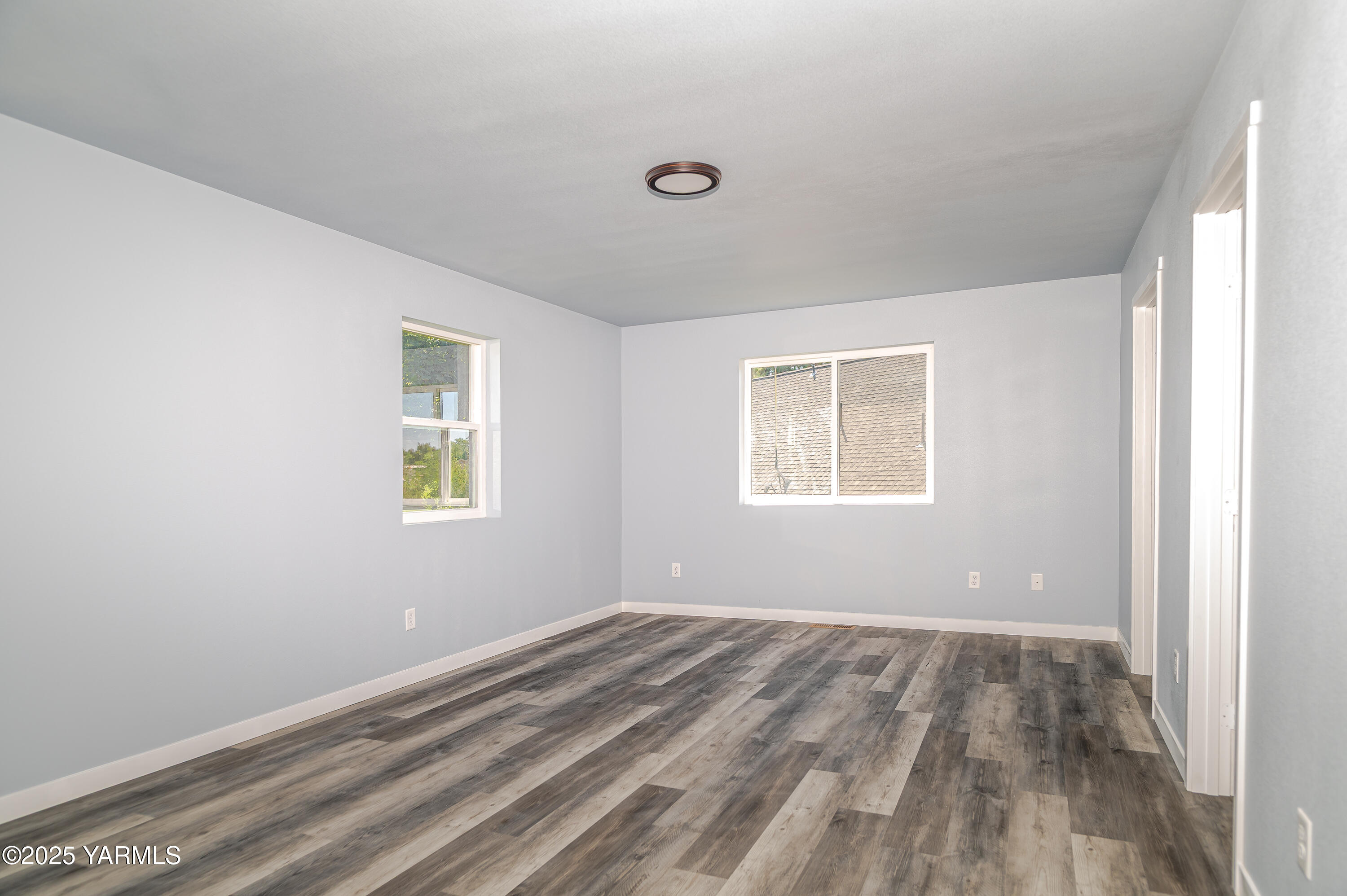 213 3rd Street East Granger, WA 98932 - Photo 7 of 12 a view of a room with a window