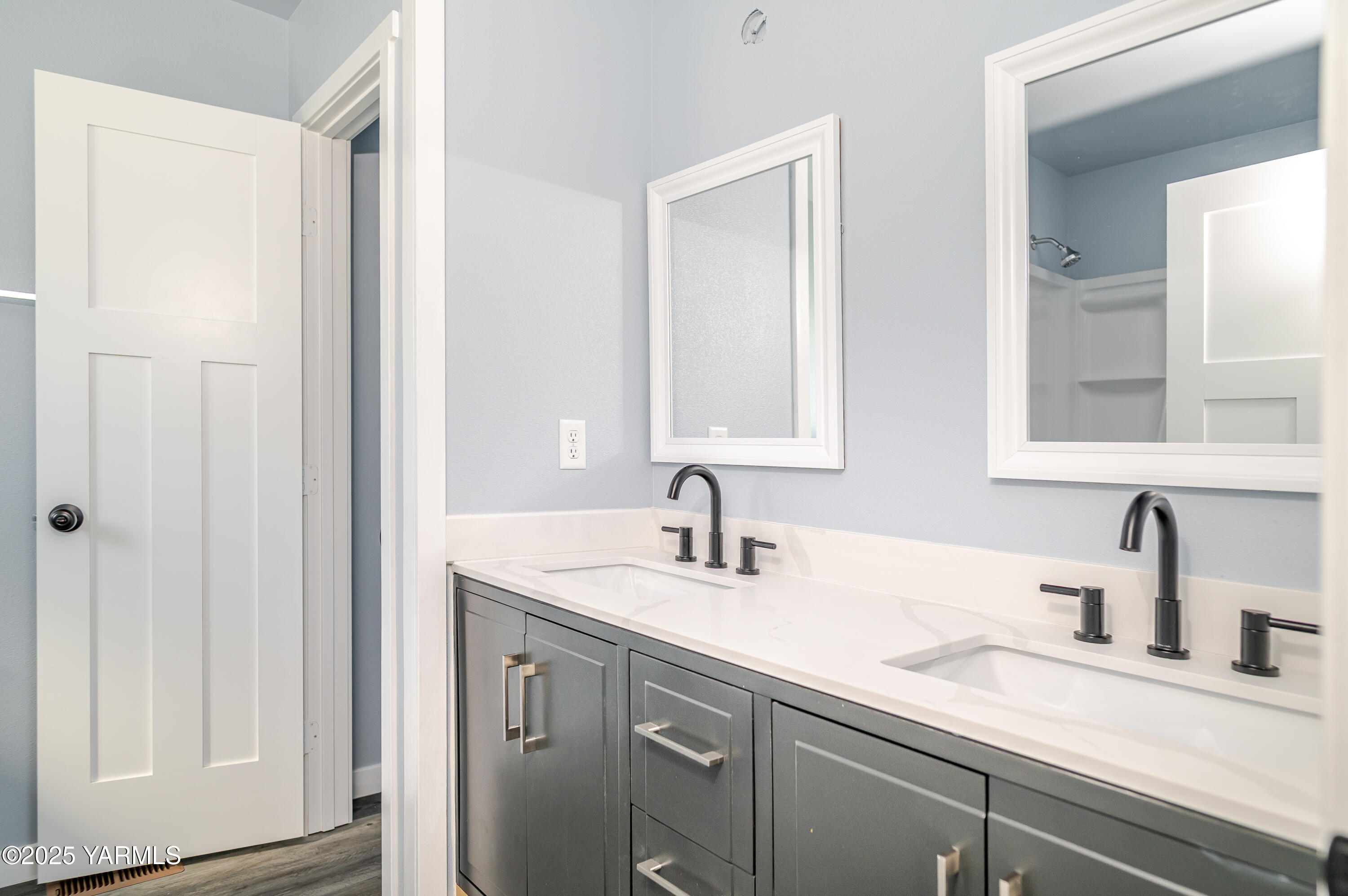 213 3rd Street East Granger, WA 98932 - Photo 8 of 12 a bathroom with a sink and a mirror