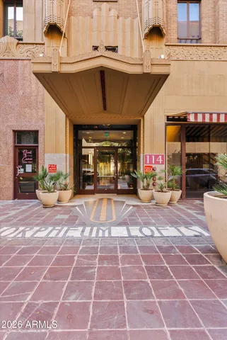 a view of a entryway door front of building