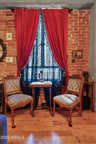 a view of a chairs and table in a patio