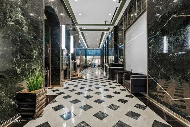 a view of a balcony with chairs