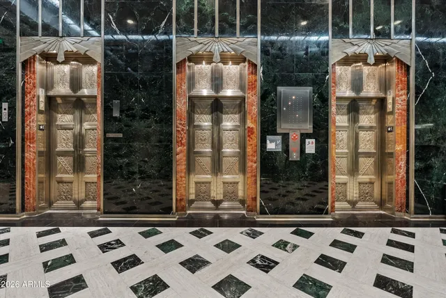 a kitchen with stainless steel appliances granite countertop a stove and a refrigerator
