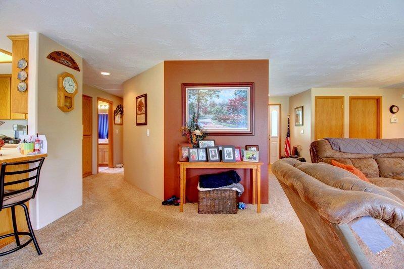 557 Mitchell Way Central Point, OR 97502 - Photo 9 of 23 a living room with furniture and a fireplace