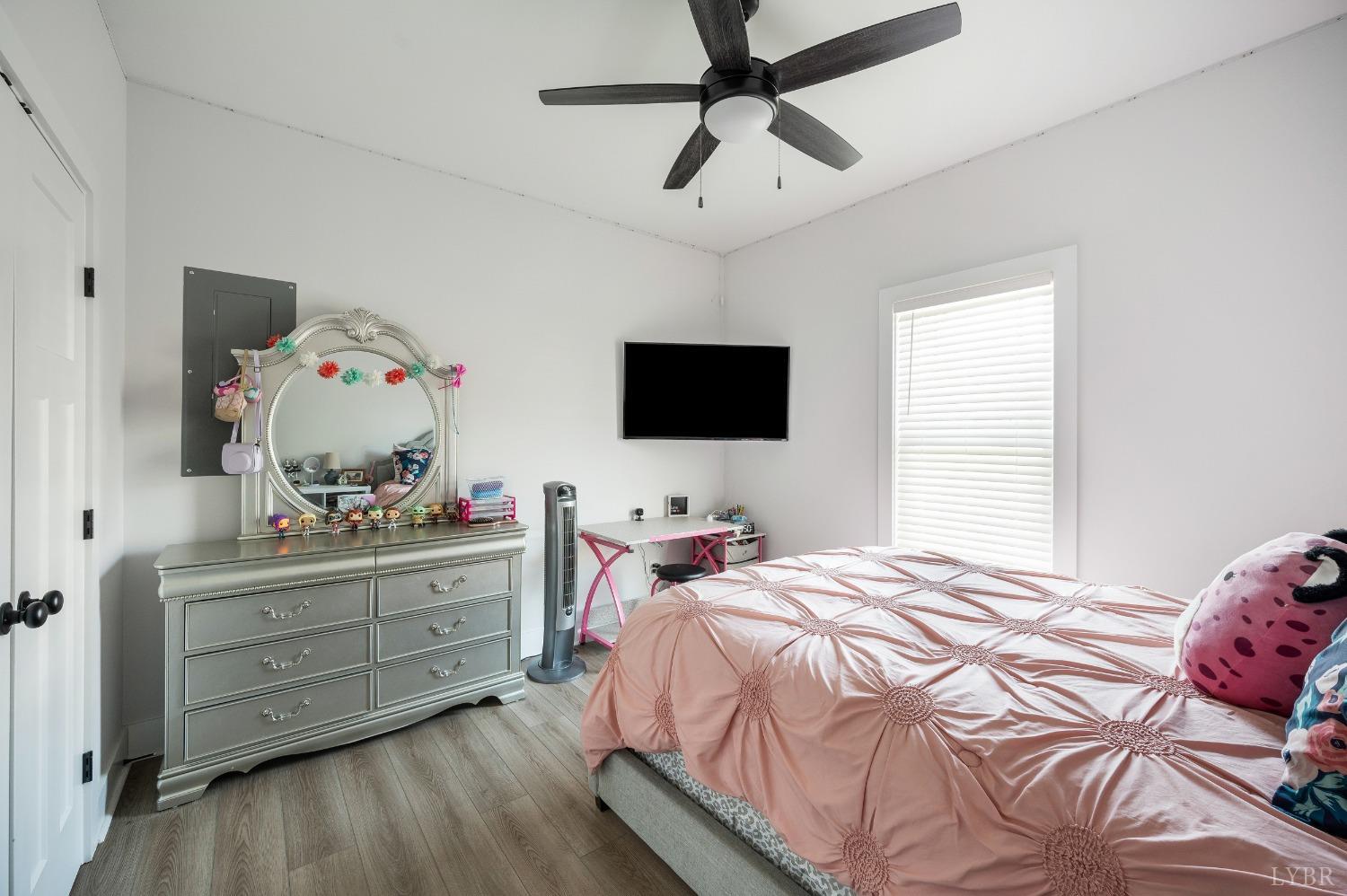 36 Porter Lane Forest, VA 24551 - Photo 15 of 25 a bedroom with a bed and a flat screen tv