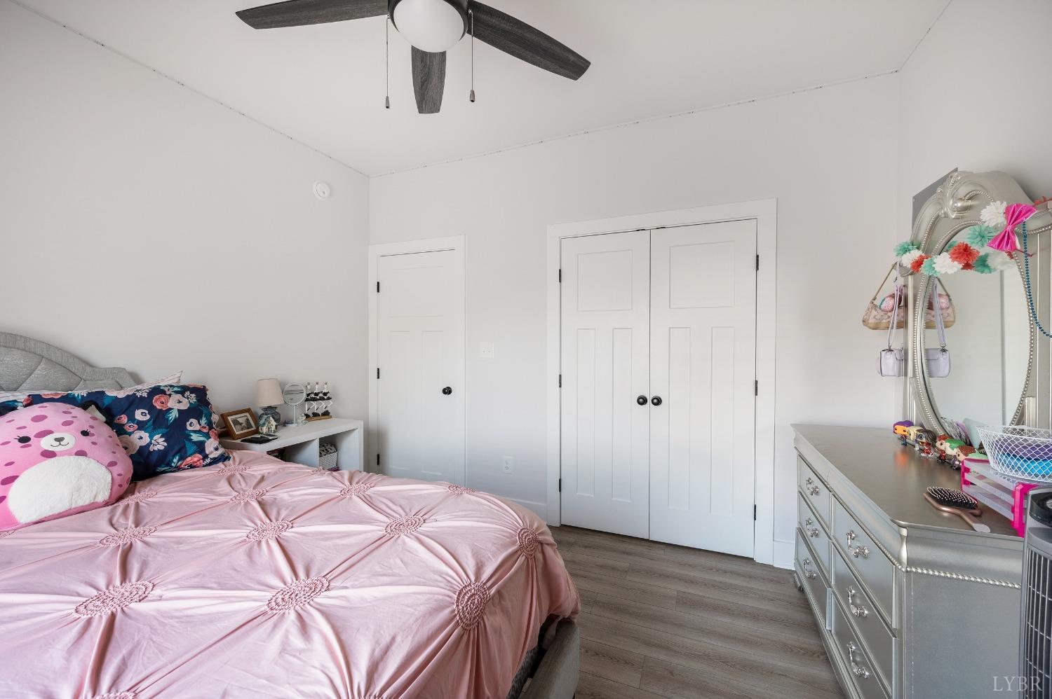 36 Porter Lane Forest, VA 24551 - Photo 16 of 25 a bedroom with a bed and a dresser
