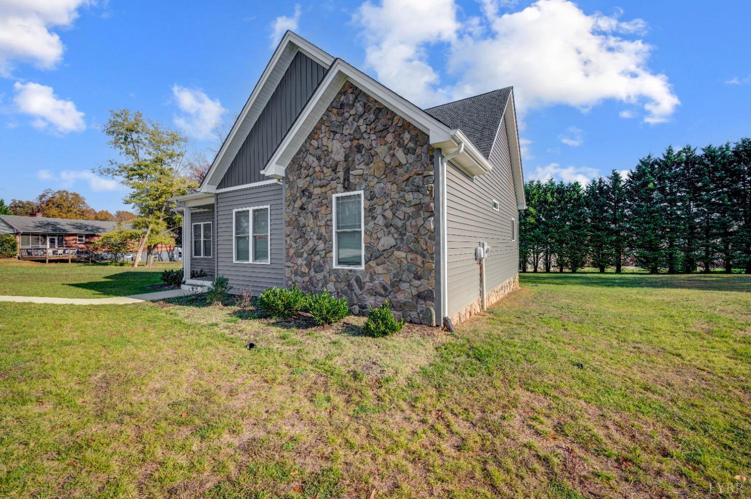 36 Porter Lane Forest, VA 24551 - Photo 21 of 25 a view of a house with backyard and trees