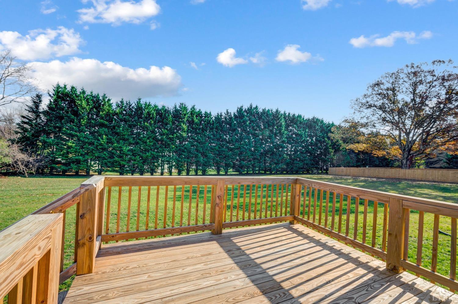 36 Porter Lane Forest, VA 24551 - Photo 3 of 25 a view of a wooden deck and a yard