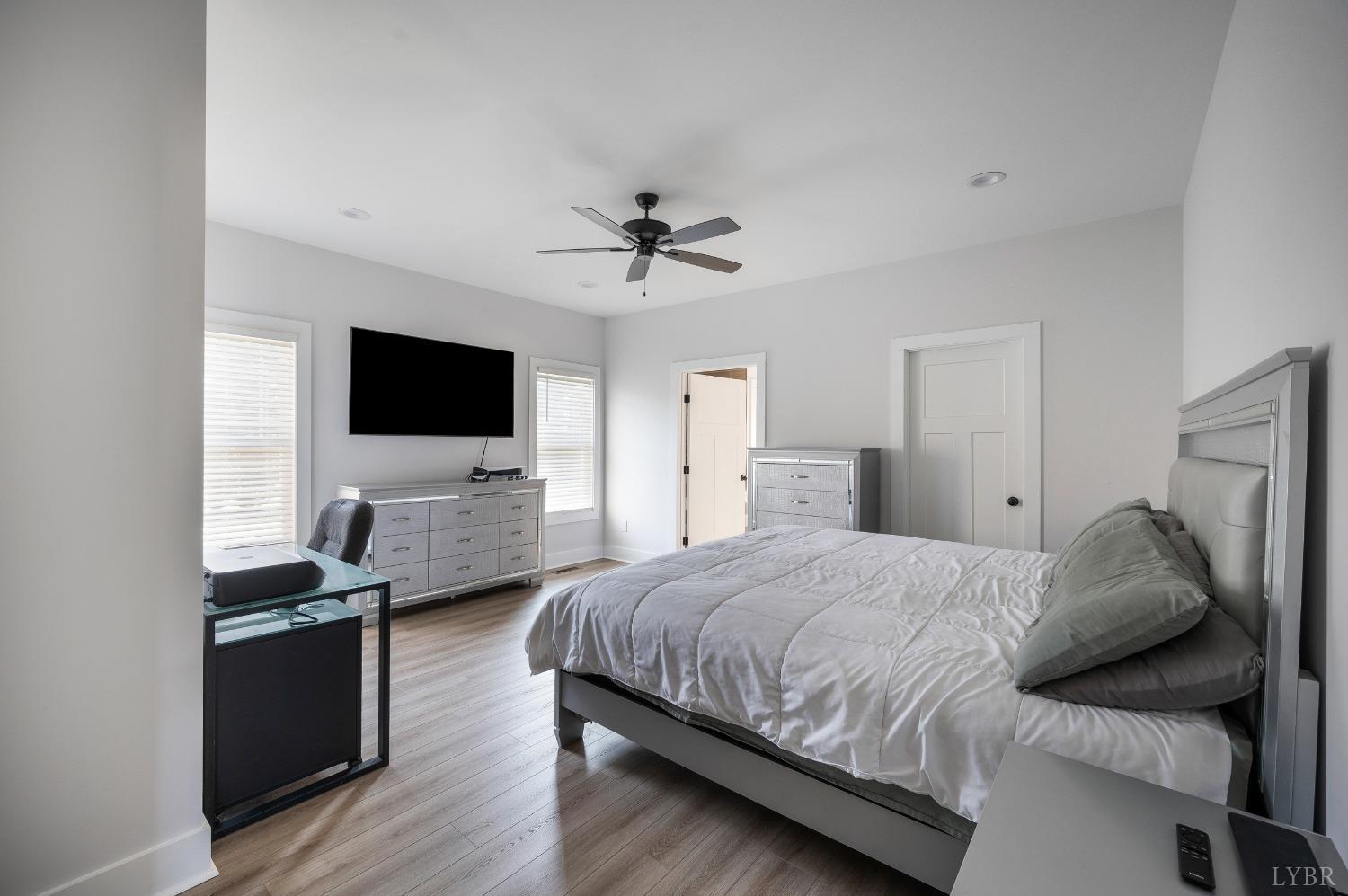 36 Porter Lane Forest, VA 24551 - Photo 9 of 25 a bedroom with a bed and a flat screen tv