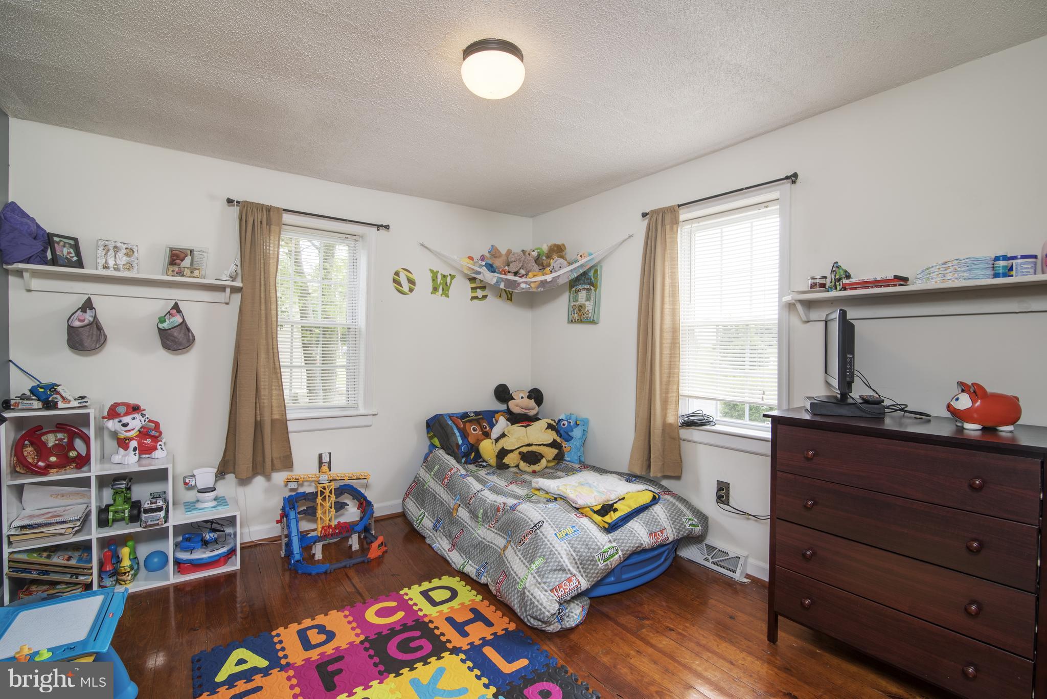 11306 Sword Road Williamsport, MD 21795 - Photo 11 of 30 a bedroom with furniture and a window