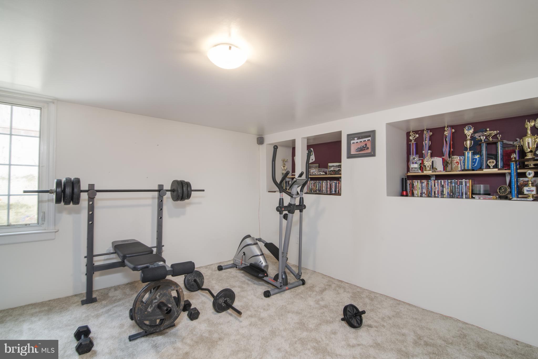11306 Sword Road Williamsport, MD 21795 - Photo 19 of 30 a view of a room with gym equipment