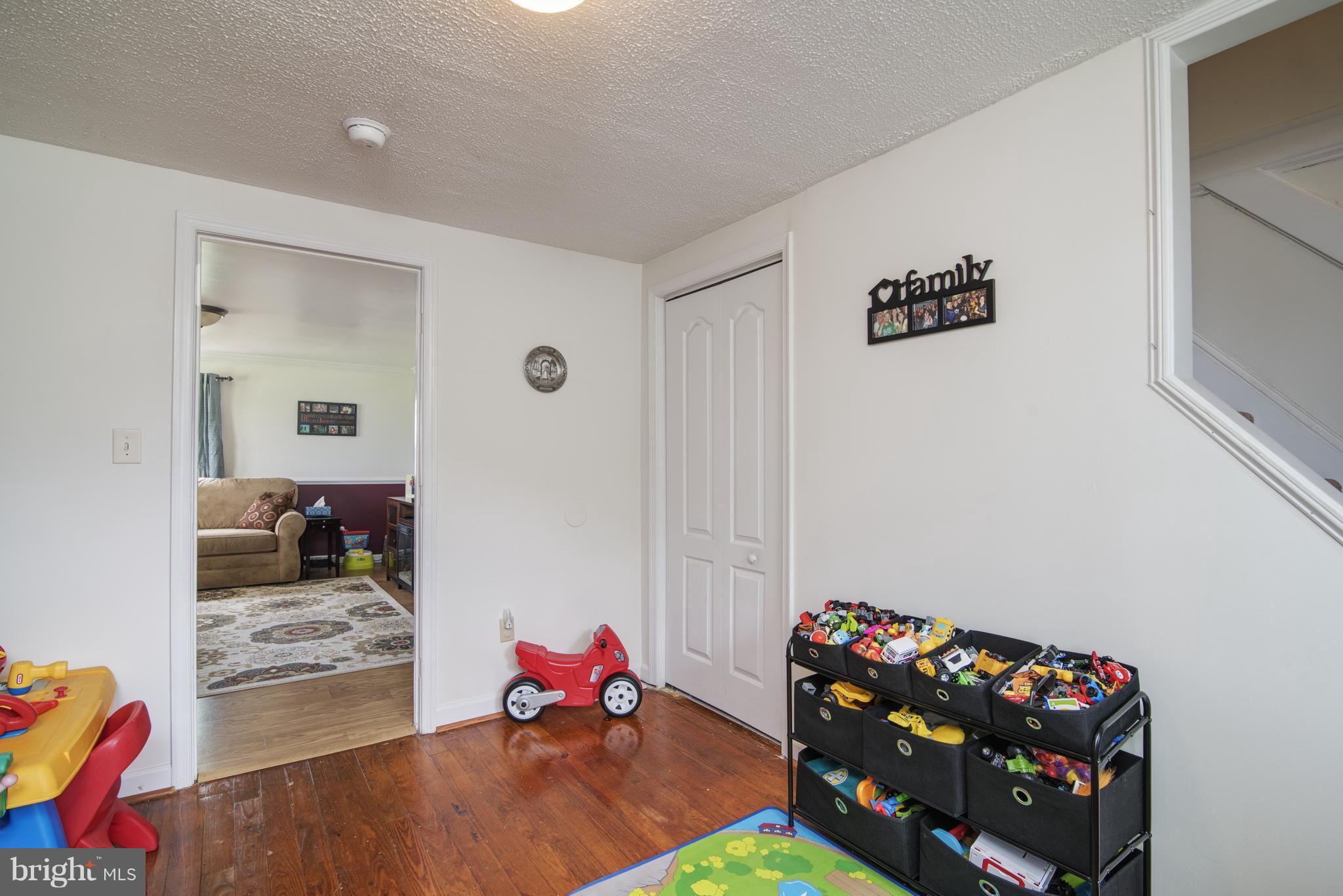 11306 Sword Road Williamsport, MD 21795 - Photo 22 of 30 a living room with furniture and a couch