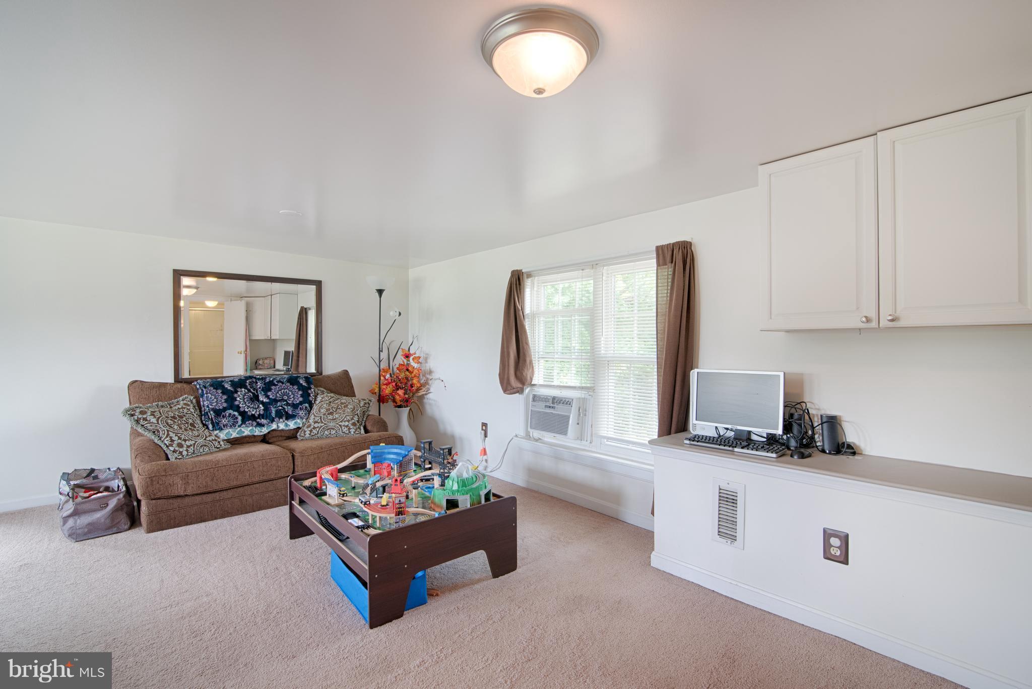 11306 Sword Road Williamsport, MD 21795 - Photo 24 of 30 a living room with furniture and a window