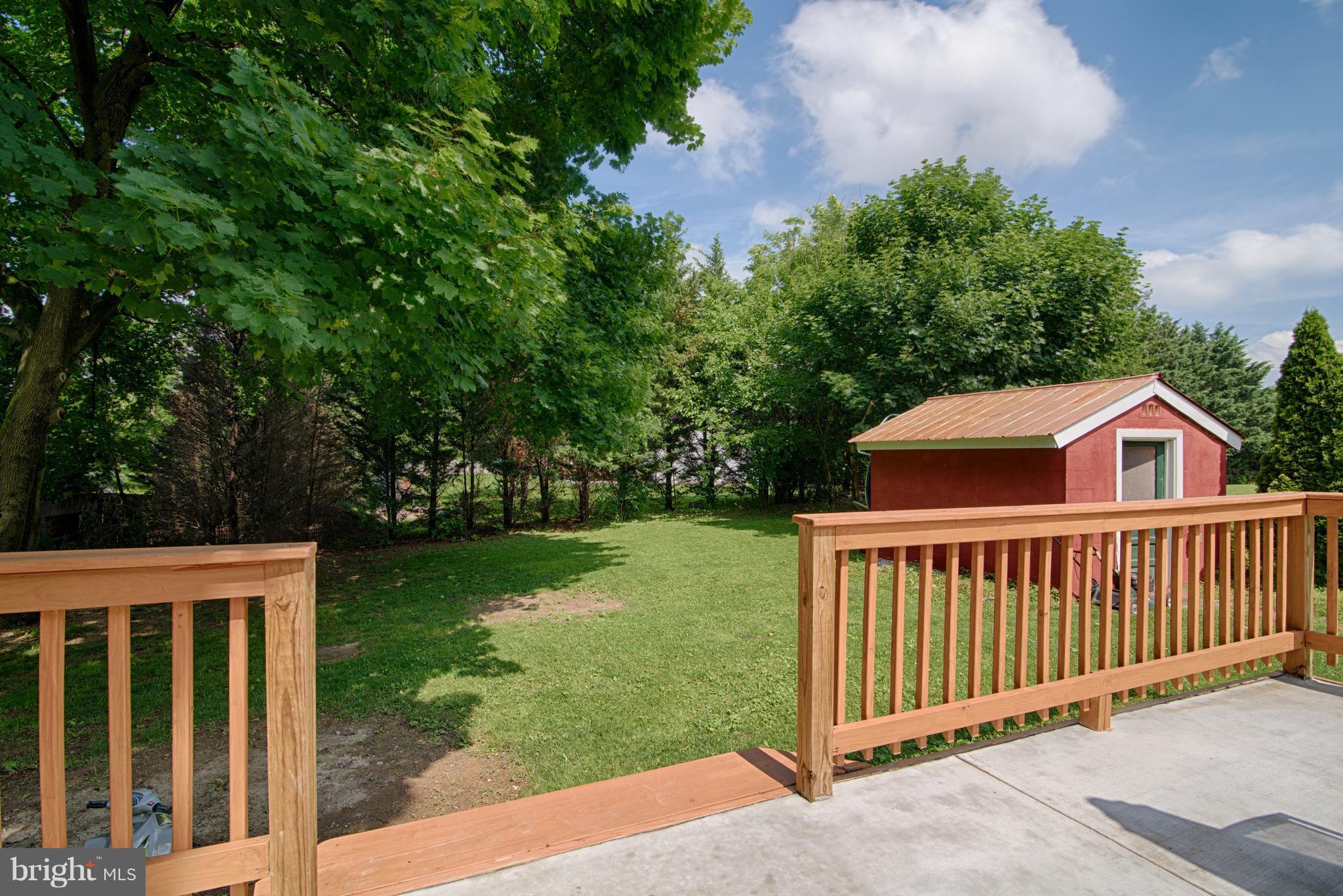 11306 Sword Road Williamsport, MD 21795 - Photo 30 of 30 a view of a house with backyard and porch
