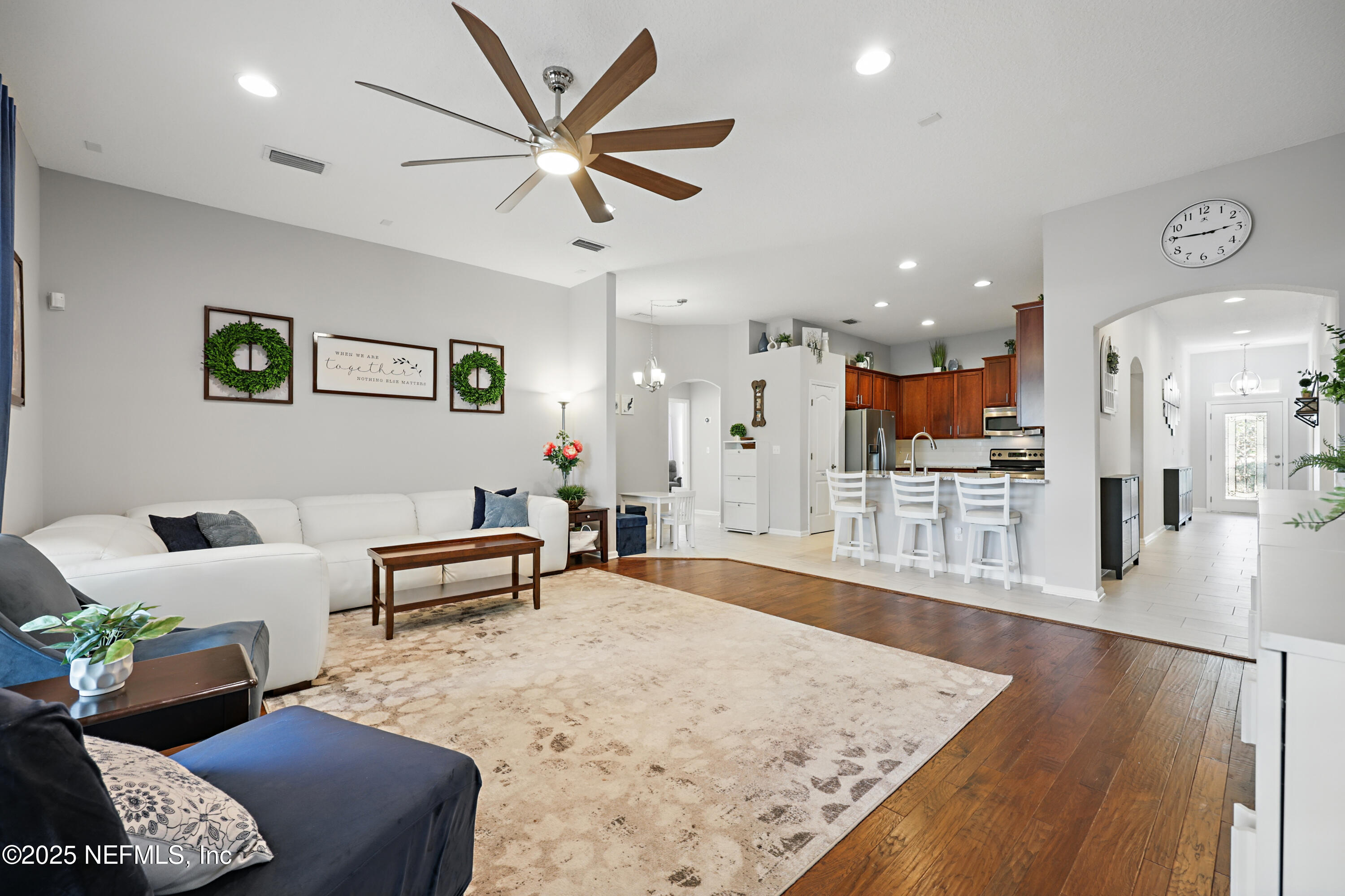 672 Porta Rosa Circle St. Augustine, FL 32092 - Photo 11 of 42 a living room with furniture and a view of kitchen