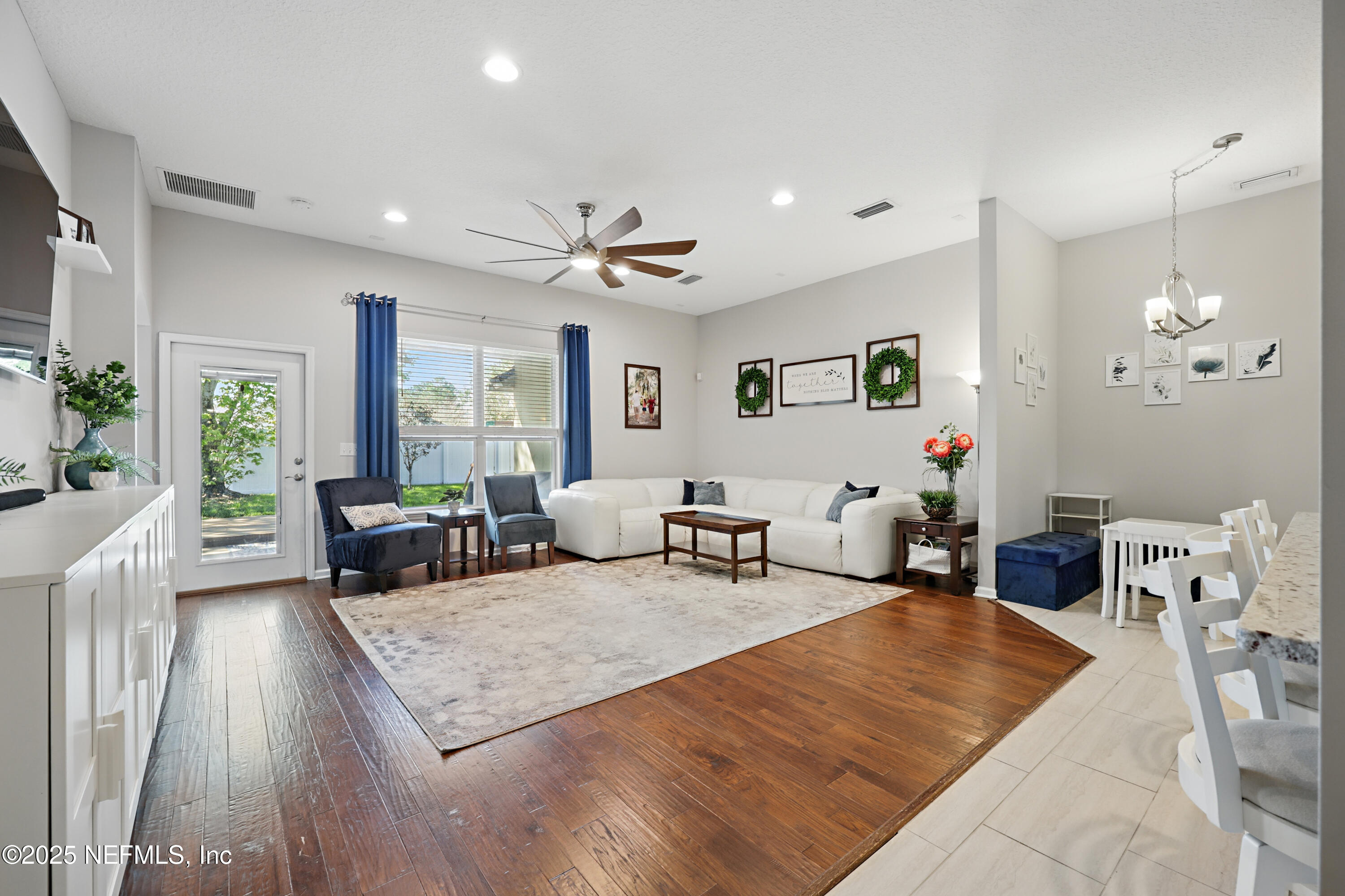 672 Porta Rosa Circle St. Augustine, FL 32092 - Photo 3 of 42 a living room with furniture and wooden floor