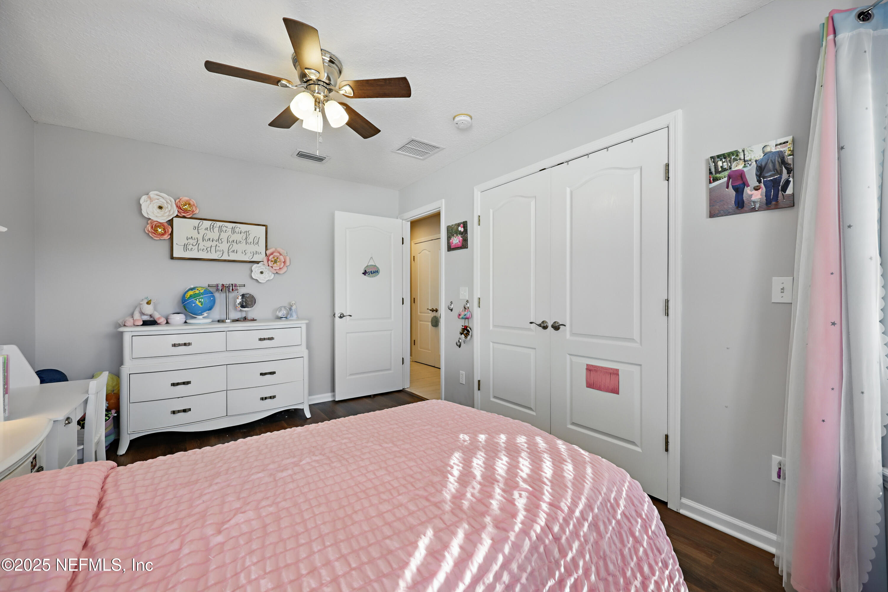 672 Porta Rosa Circle St. Augustine, FL 32092 - Photo 32 of 42 a bedroom with a bed and a closet