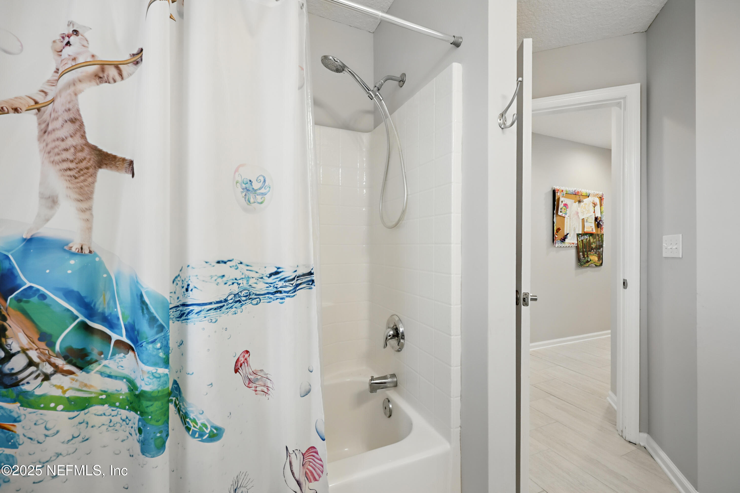 672 Porta Rosa Circle St. Augustine, FL 32092 - Photo 34 of 42 a bathroom with a bathtub and shower