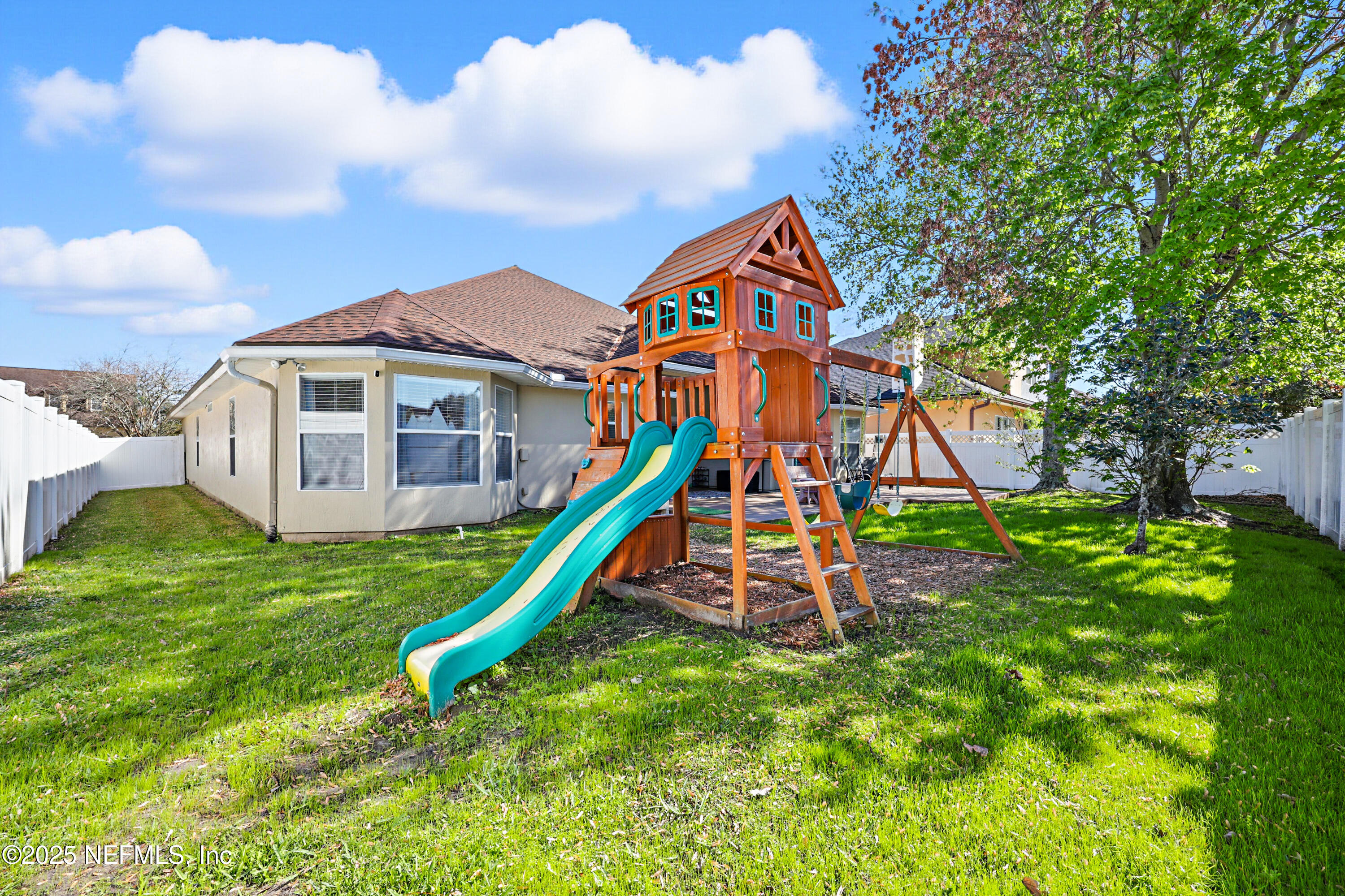 672 Porta Rosa Circle St. Augustine, FL 32092 - Photo 35 of 42 a view of a house with a park
