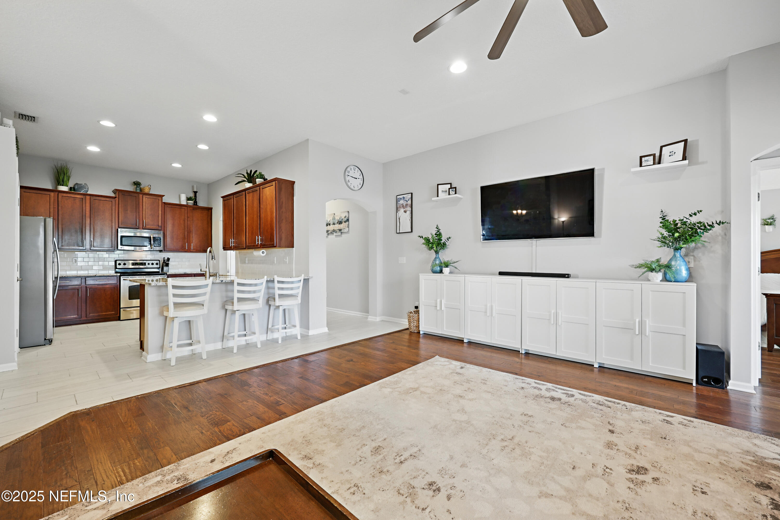 672 Porta Rosa Circle St. Augustine, FL 32092 - Photo 4 of 42 a living room with furniture and a flat screen tv
