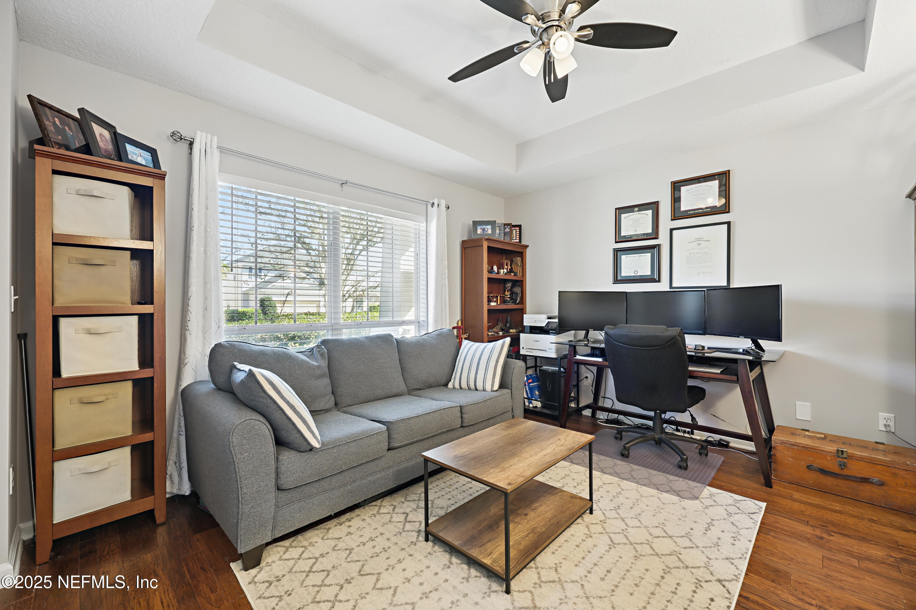 672 Porta Rosa Circle St. Augustine, FL 32092 - Photo 7 of 42 a living room with furniture and a window