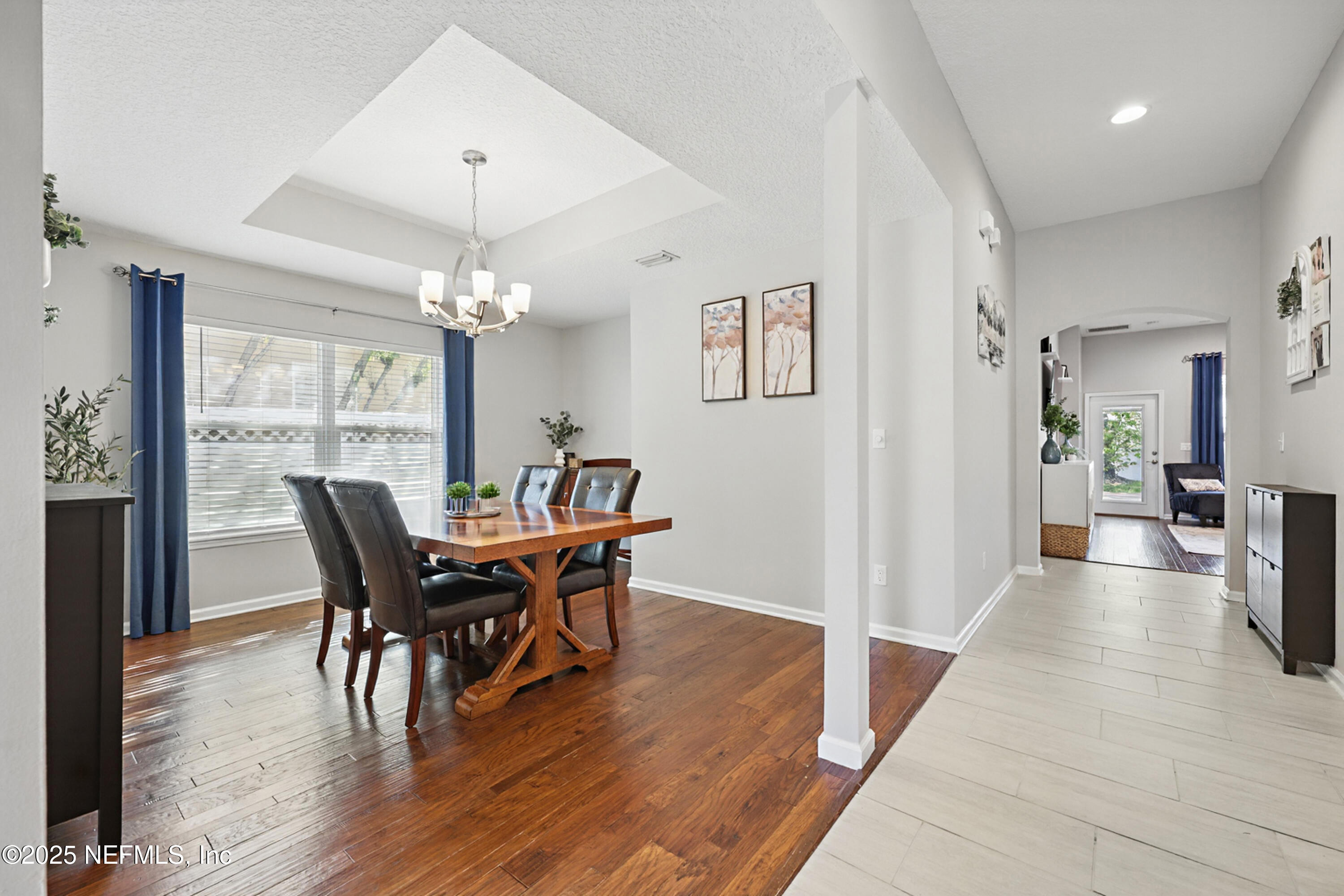 672 Porta Rosa Circle St. Augustine, FL 32092 - Photo 9 of 42 a view of a dining room with furniture window and wooden floor