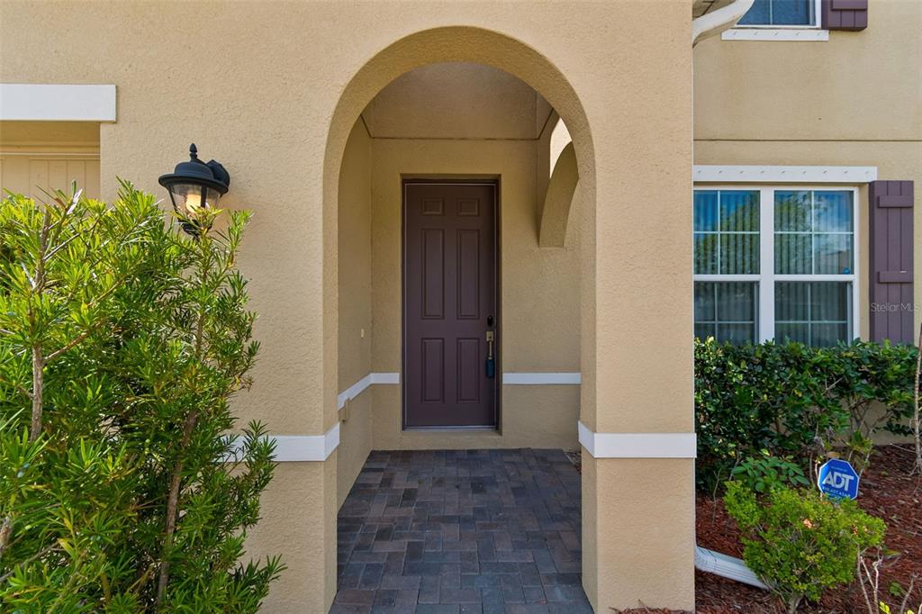1192 Multiflora Loop Lutz, FL 33558 - Photo 6 of 32 a view of front door of house