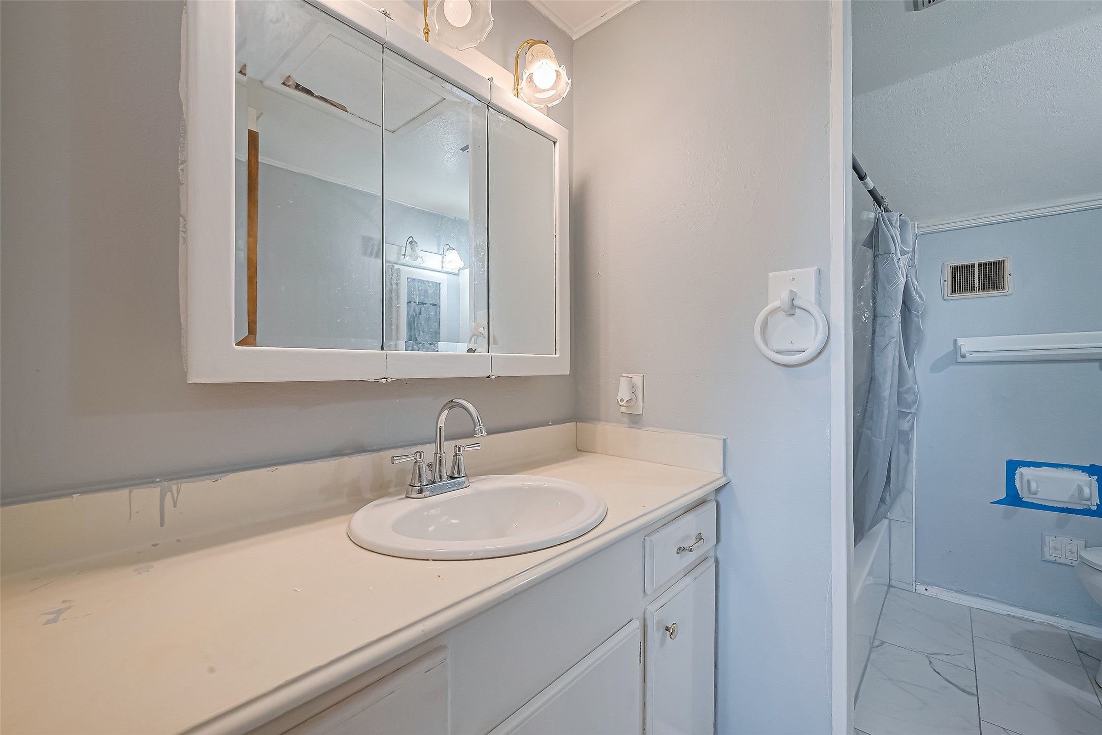 13351 Oak Leaf Lane Houston, TX 77015 - Photo 21 of 27 a bathroom with a sink and a mirror