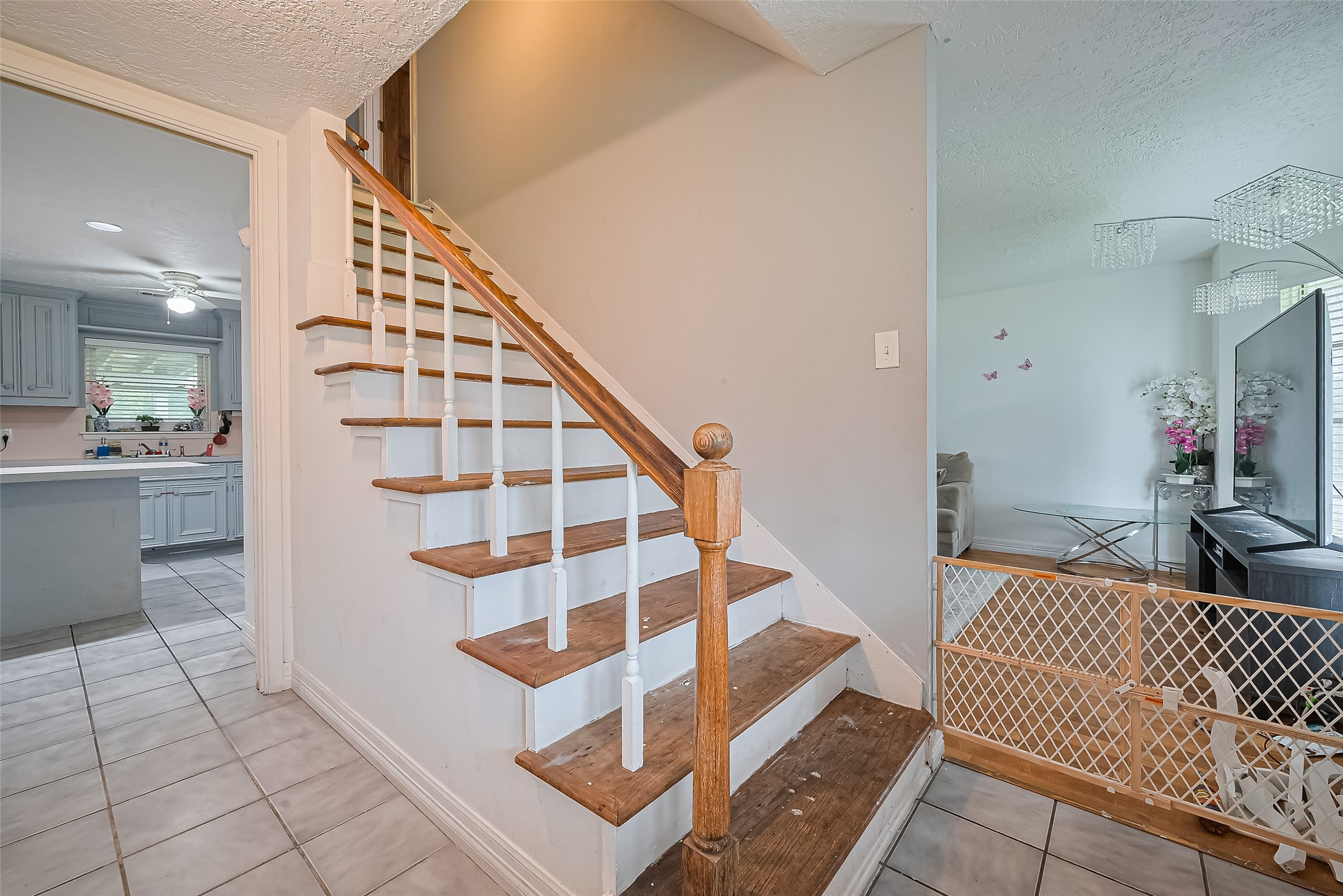 13351 Oak Leaf Lane Houston, TX 77015 - Photo 3 of 27 a view of a bedroom with wooden floor and windows