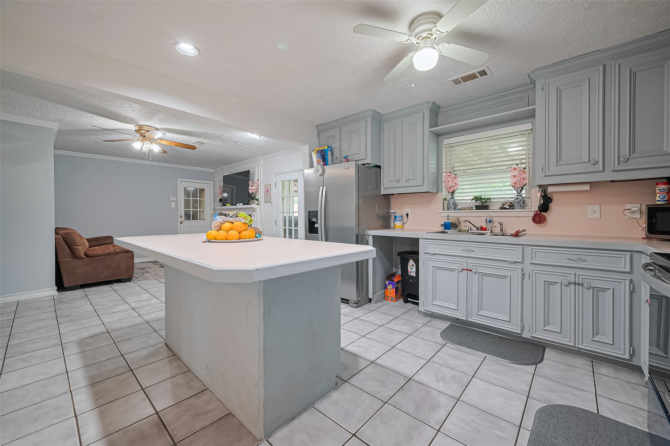 13351 Oak Leaf Lane Houston, TX 77015 - Photo 9 of 27 a view of kitchen with stainless steel appliances granite countertop a sink counter top space cabinets and a window