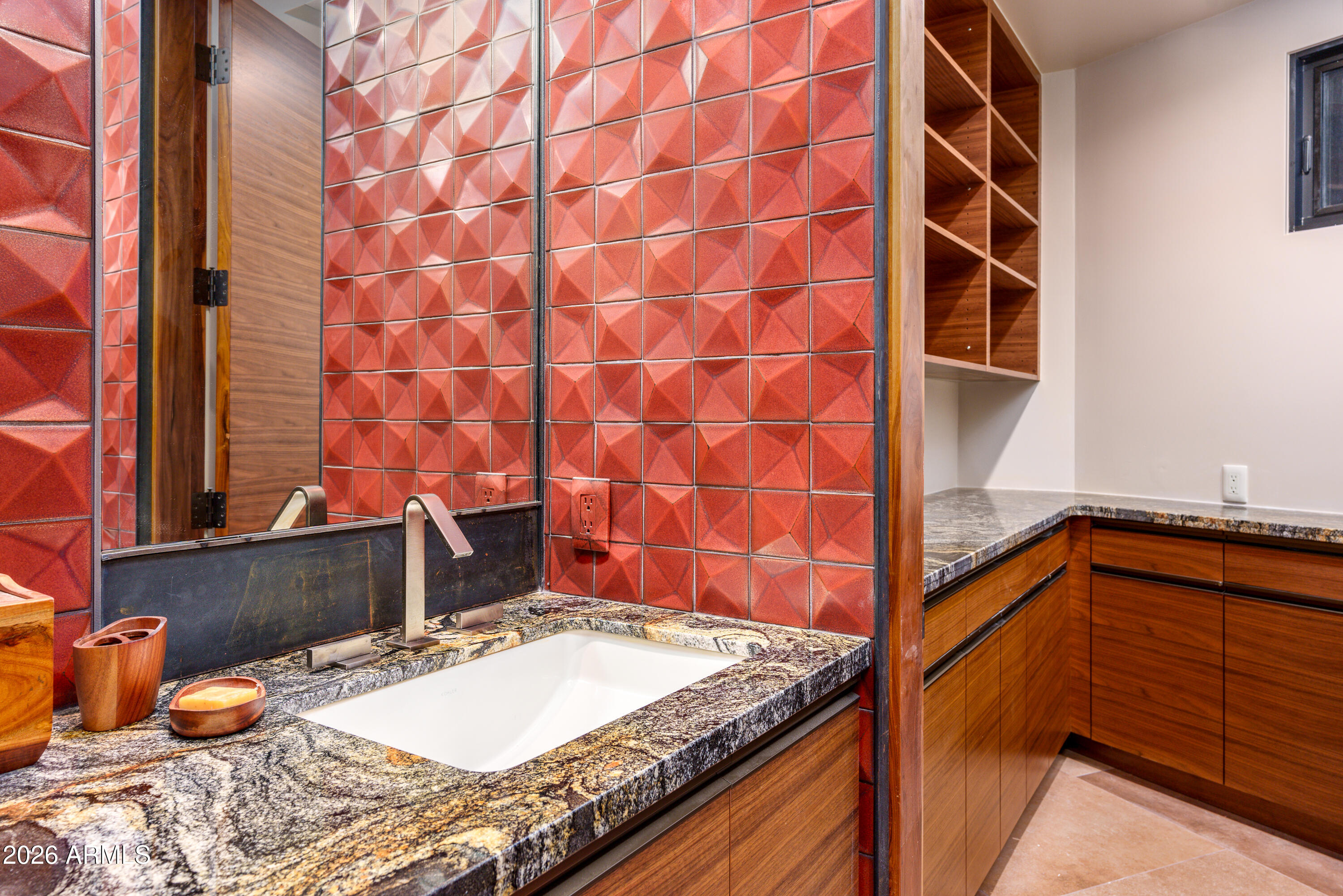 120 Paisano Road Sedona, AZ 86336 - Photo 32 of 52 a bathroom with a granite countertop sink and a mirror
