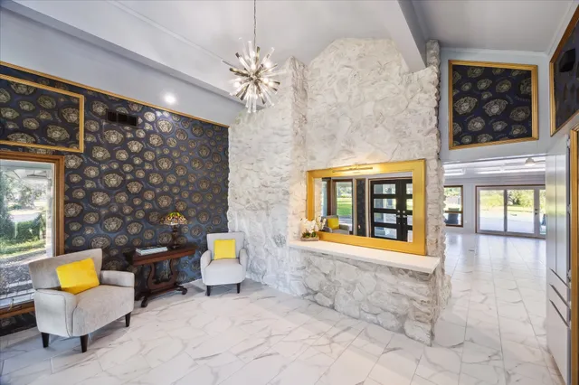 a bedroom with a bed and a table