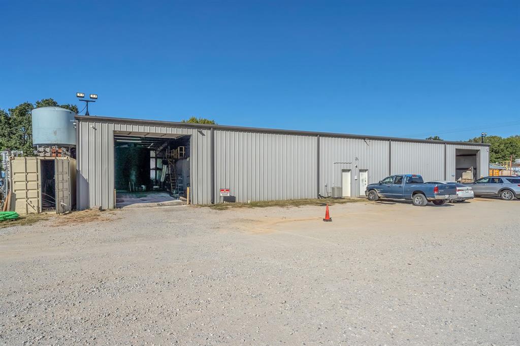 2522 Highway 287 Decatur, TX 76234 - Photo 14 of 25 a view of a kitchen with a sink and a fireplace