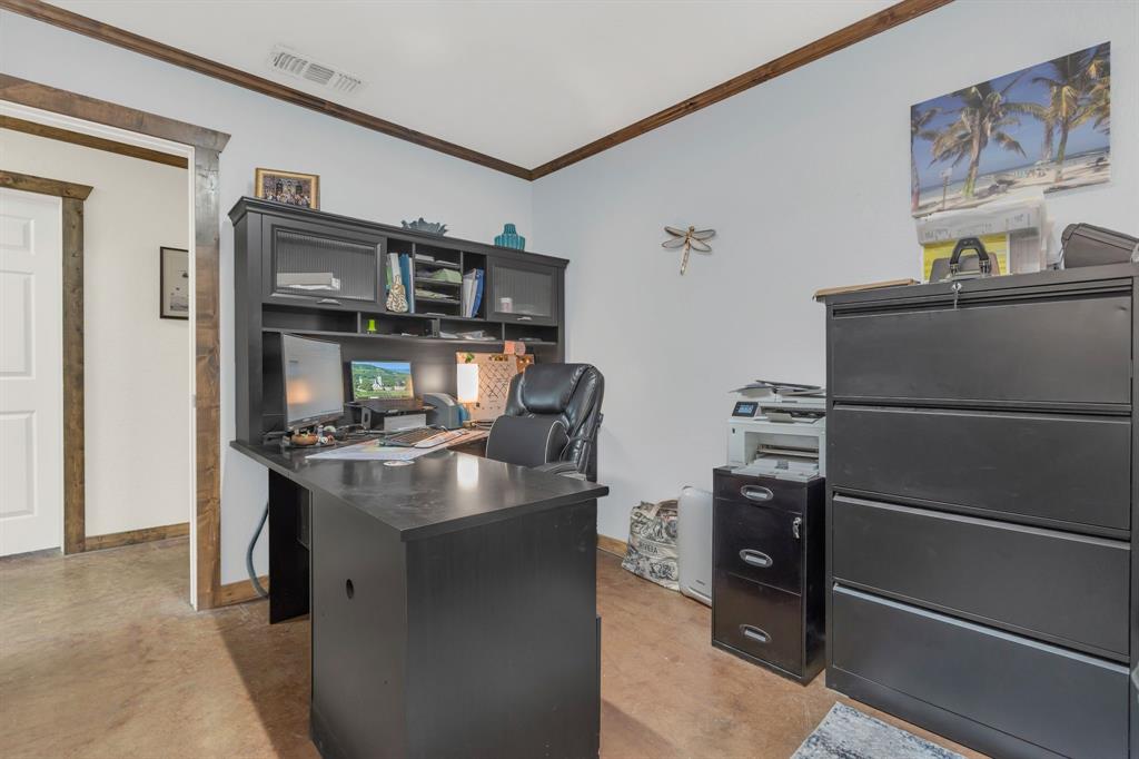 2522 Highway 287 Decatur, TX 76234 - Photo 22 of 25 a kitchen with stainless steel appliances granite countertop a refrigerator and a stove top oven