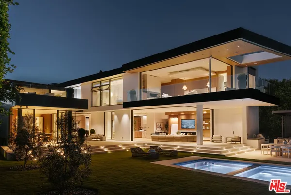 a front view of a house with a ocean view