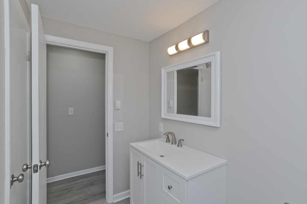 35 Ludlow Road South Hadley, MA 01075 - Photo 16 of 34 a bathroom with a sink and a mirror