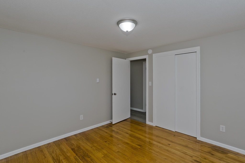 35 Ludlow Road South Hadley, MA 01075 - Photo 19 of 34 a view of an empty room and wooden floor